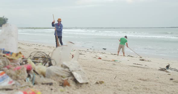 Group of Volunteer People Are Cleaning the Sea Beach