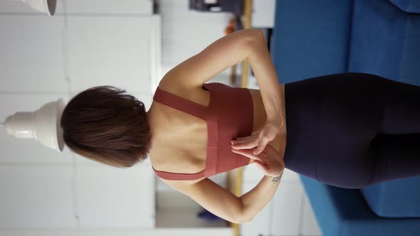 Rear View of a Woman Connecting Hands Behind Her Back Yoga Concept