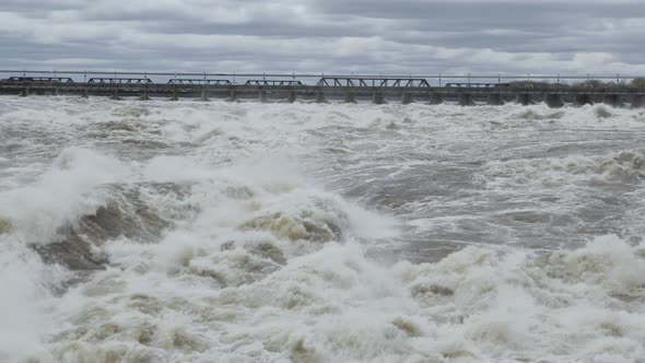 View of Chaudiere Power Dam from EB Eddy Bridge in Ottawa during massive flood.
