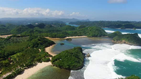 Idyllic landscape of Asmara beach, East Java coast, Indonesia, aerial view