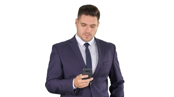 Serious worried businessman trying to call someone