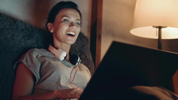 Brunette Girl Calling Online on Webcam. Happy Woman Having Video Call on Laptop.