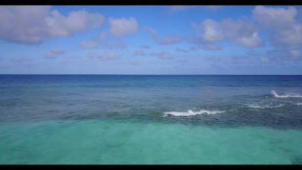 Aerial view texture of idyllic coast beach time by blue sea and white sand background of a dayout ne