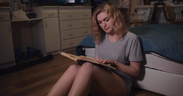 Sexy Woman with Naked Legs Reading Book