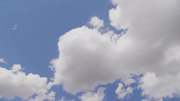 Timelapse of Cumulus Clouds Flying at High Speed