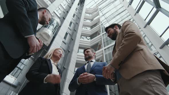 Business Partners with Lawyers Meeting in Office