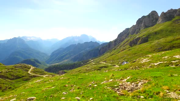 High Mountains and Some Cars Driving on it