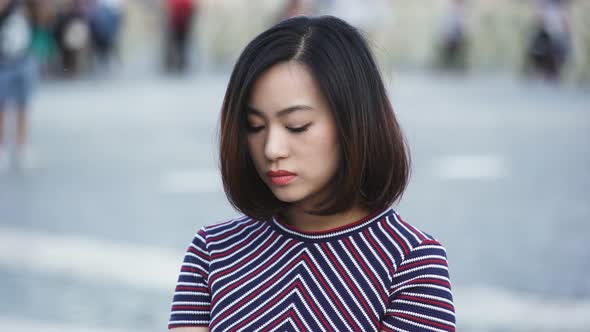 sad and worried chinese woman's portrait: sad chinese lady, pensive, worried