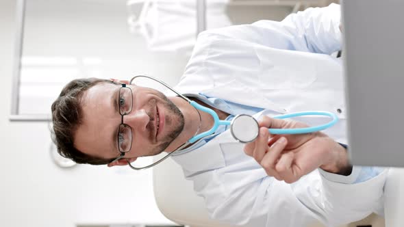 Portrait of Handsome Doctor with Stethoscope