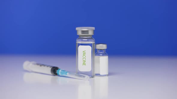 Coronavirus Vaccine Bottles on Background Laboratory Table