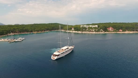 Aerial view of touristic sailing boat anchored at Adriatic sea, Croatia.