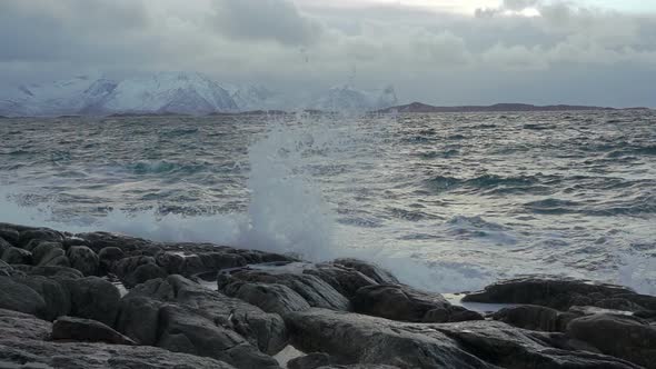 Surf on the Background of Snowy Mountains