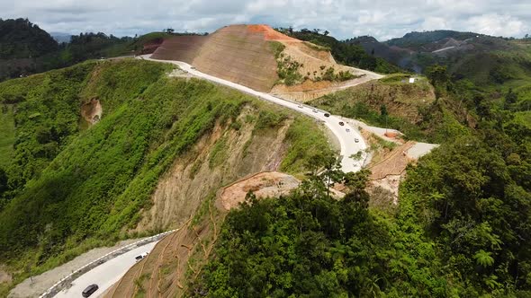 Aerial shot of cars on a mountain road