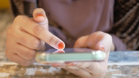 Close Up of Women Hand Holding Smart Phone