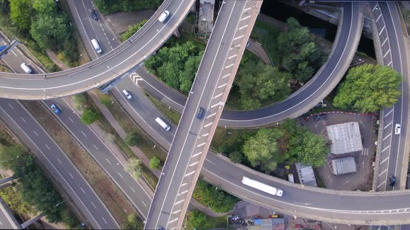 Vehicles Driving on a Mixing Interchange Bird's Eye Aerial View