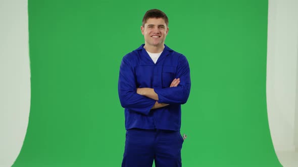 Handyman in blue overalls