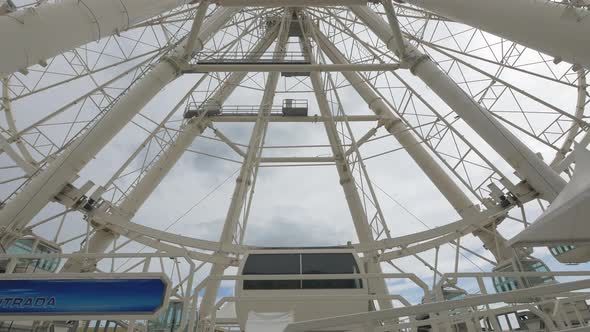 Low angle of a Ferris Wheel rotating