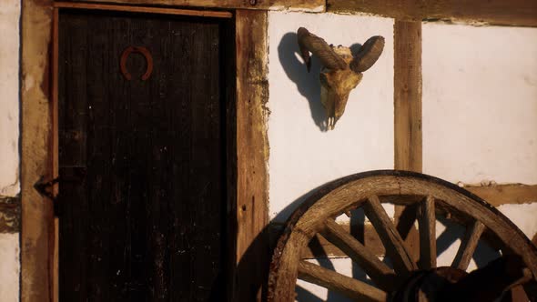 Old Wood Wheel and Black Door at White House