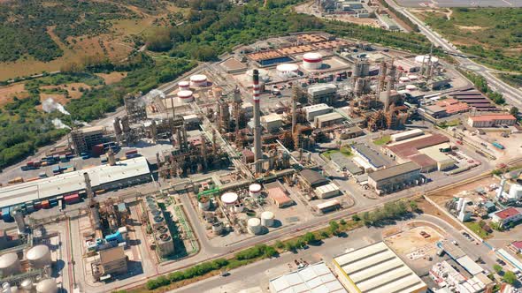 Aerial View. Oil Refinery, Chemical Factory and Power Plant with Many Storage Tanks and Pipelines