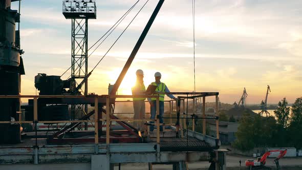 Industrial Engineers are Discussing Plans in the Quarry Zone