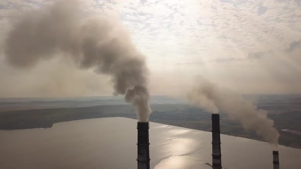 Aerial View of High Chimney Pipes with Grey Smoke From Coal Power Plant