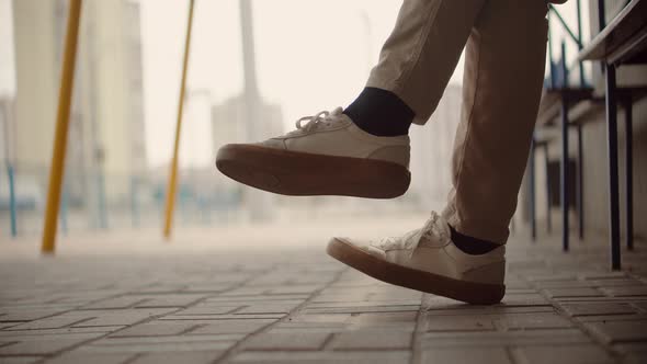 Businessman Nervous Stomping Legs And Looking Transport On Train Station.Travel Man Sitting On Bench