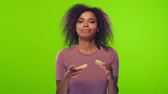 African Female Is Taking Halves of Yellow Lemons and Makes Glasses From It