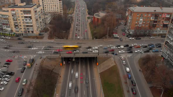 Aerial Timelapse of the Cars Passing By on a Highway and a Bridge