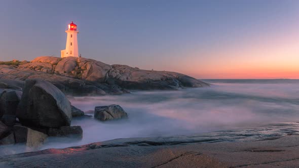 A dreamy evening at Peggy's Cove Lighthouse at dusk Nova Scotia Canada