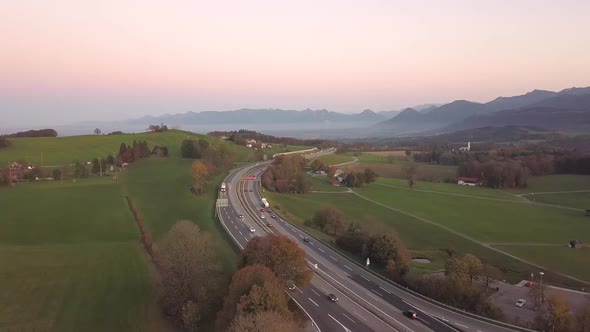 Aerial view of highway interstate road with fast moving traffic in europe.