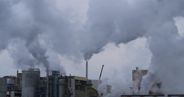 Paper Factory, Tartas, Landes department, France. Water vapor against  a grey sky