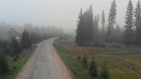 Foggy Morning Scene in Mountain Village