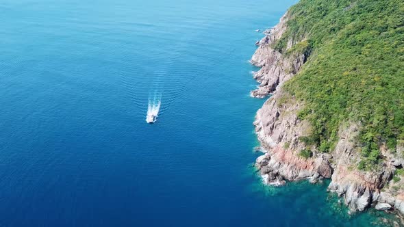 Drone View White Luxury Motor Yacht Sailing on Blue Sea.