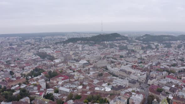 Aerial Drone Video of European City Lviv Ukraine Rynok Square Central Town Hall Dominican Church