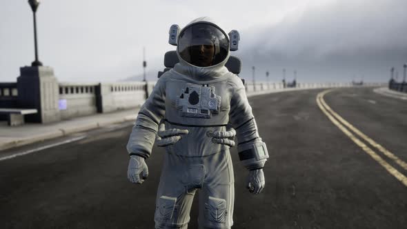 Astronaut in Space Suit on the Road Bridge