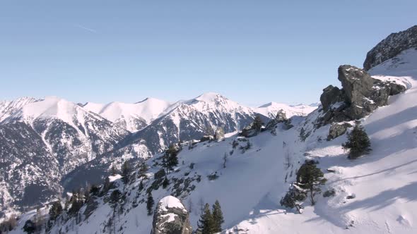 austrian mountain range reveal by a drone at a sunny day