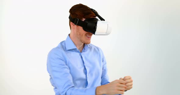 Man gesturing while using virtual reality headset