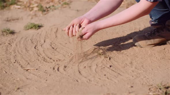 Farmer Touching Dirt in Hands Pouring Organic Soil