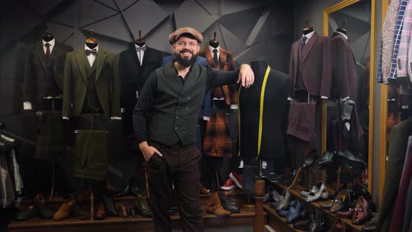 Creative Stylist Portrait. Bearded Tailor Portrait. Handmade Costume Designer Works in His Store