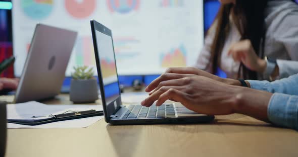 Hands which Typing on Keyboard Entering Needed Information Into Computer in Office