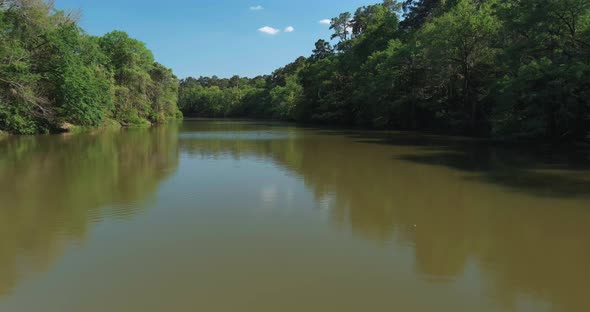 4k aerial of large lake in Houston located near the Lake Houston dam