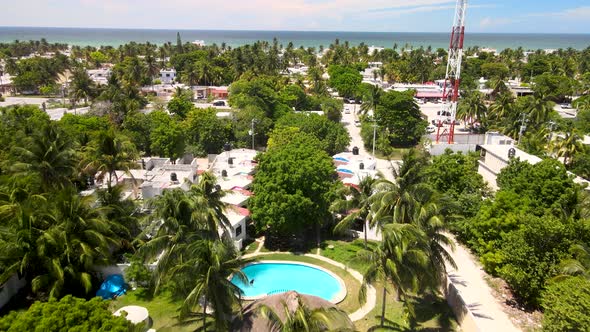 View of pool and ocean view in chelem