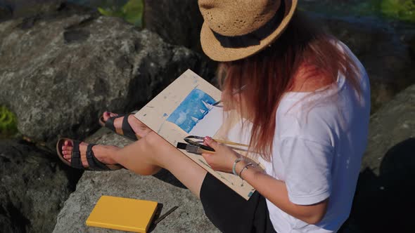 Inspiration By Nature Painting Marine Seascape From Real Life Young Lady is Drawing Sea