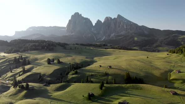 Aerial slider shot of Alpe di Suisi meadow  in the Dolomites mountains Italy