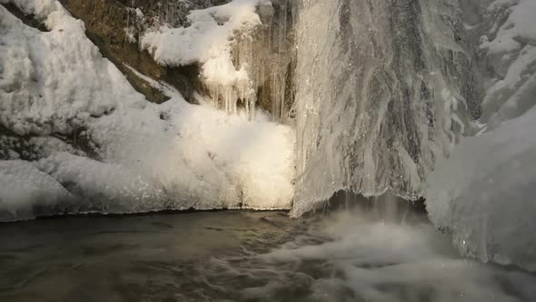 Frozen Waterfall Stream in Cold Winter