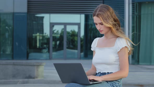 Smiling Attractive Young Woman Sitting Outdoor Using Laptop Communicating Working Online Happy Girl