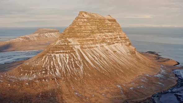 Drone Pulling Back From Kirkjufell Mountain