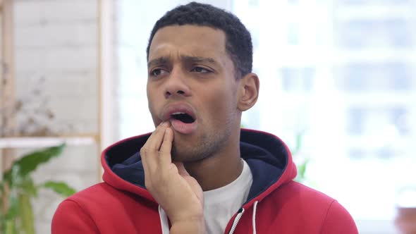 Close Up of Toothache AfroAmerican Man with Pain