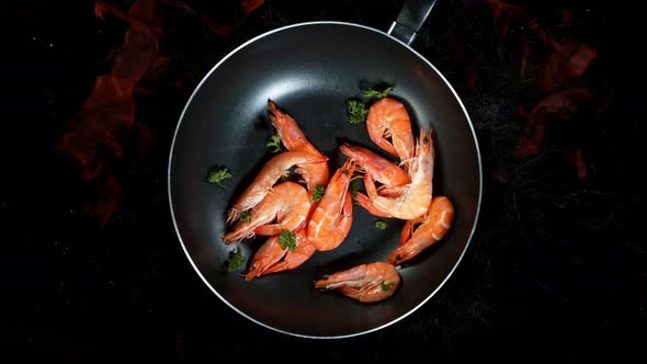 Super Slow Motion Shot of Throwing Prawns on Frying Pan and Fire Blast at 1000Fps