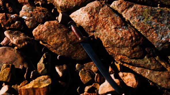 Old Dagger on the Rock at Sunset